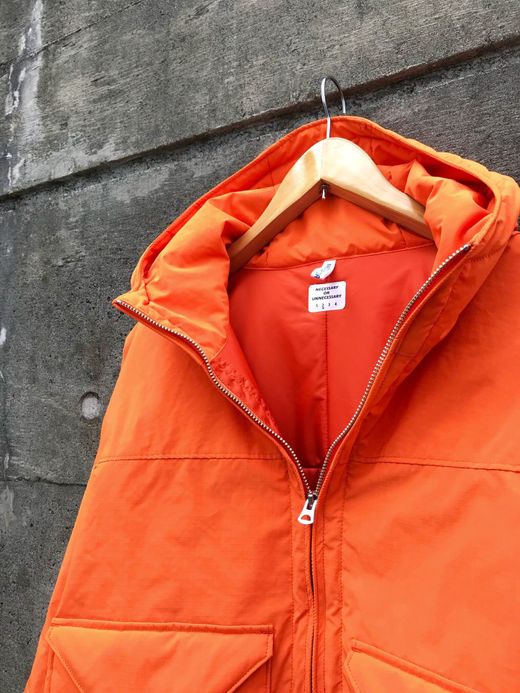 NECESSARY or UNNECESSARY Velo Hooded / orange