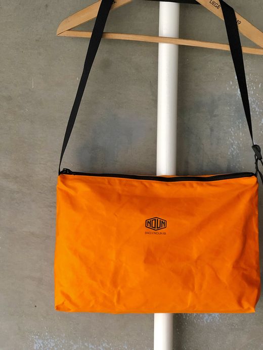 NECESSARY or UNNECESSARY 90020740 / NOUN POST 'VINYLON' / ORANGE