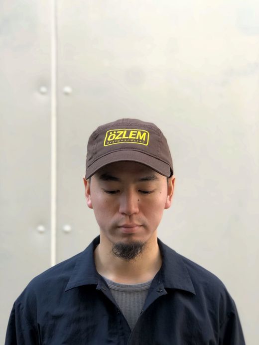 NECESSARY or UNNECESSARY 90030241 / JET CAP/HEAVY STECHED / BROWN