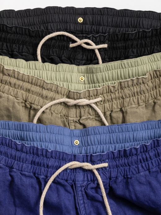 ANACHRONORM OVER DYE TAPERED EASY PANTS / Light olive