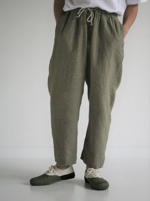 ANACHRONORM OVER DYE TAPERED EASY PANTS / Light olive