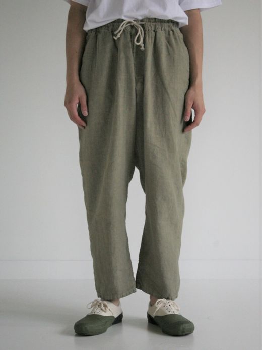 ANACHRONORM OVER DYE TAPERED EASY PANTS / Light olive