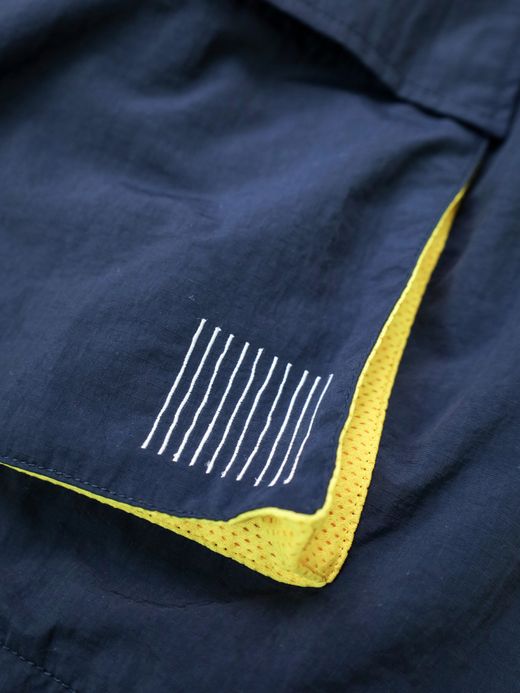 S.F.C 6 POCKET SHORTS / Navy×yellow