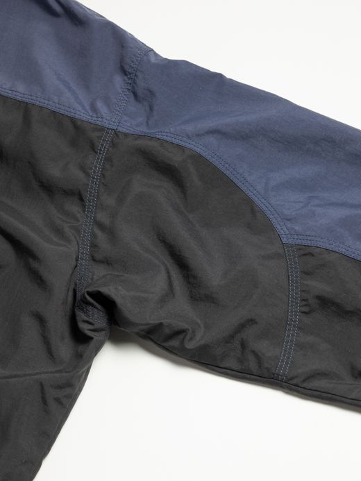 ANACHRONORM EXCHANGE PATTERN NYLON JACKET / Navy x black