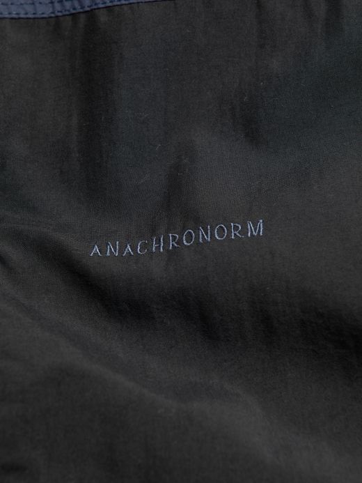 ANACHRONORM EXCHANGE PATTERN NYLON JACKET / Navy x black