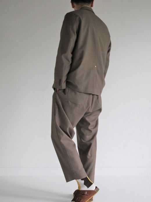 ANACHRONORM SUMMER WOOL TAPERED TROUSERS / Brown